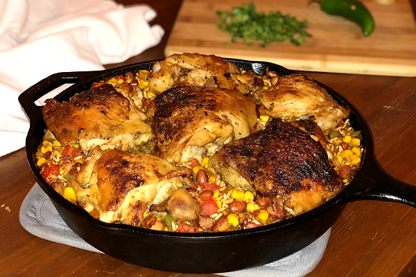 Easy One Pan Mexican Chicken and Rice | Packed with flavor and comes together in one pan...that's a reason to celebrate!
