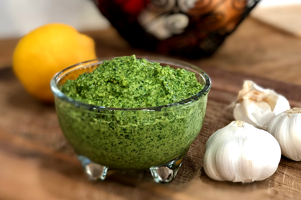 Kale Pesto | This quick, easy kale pesto tastes so fresh and delicious...and since we're not adding any parmesan, it's vegan and paleo!